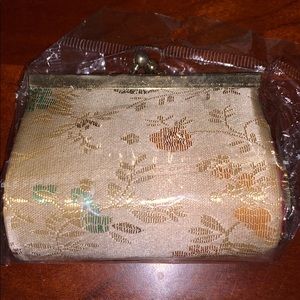 Change Purse in original packaging.